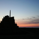 Illustration for article titled Massive sandcastle Minas Tirith awaits the approaching onslaught of waves